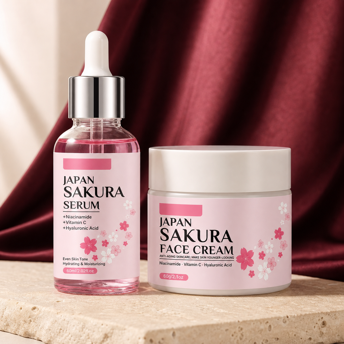 Blossom Ritual Facial Serum & Cream Duo on ivory stone with burgundy fabric